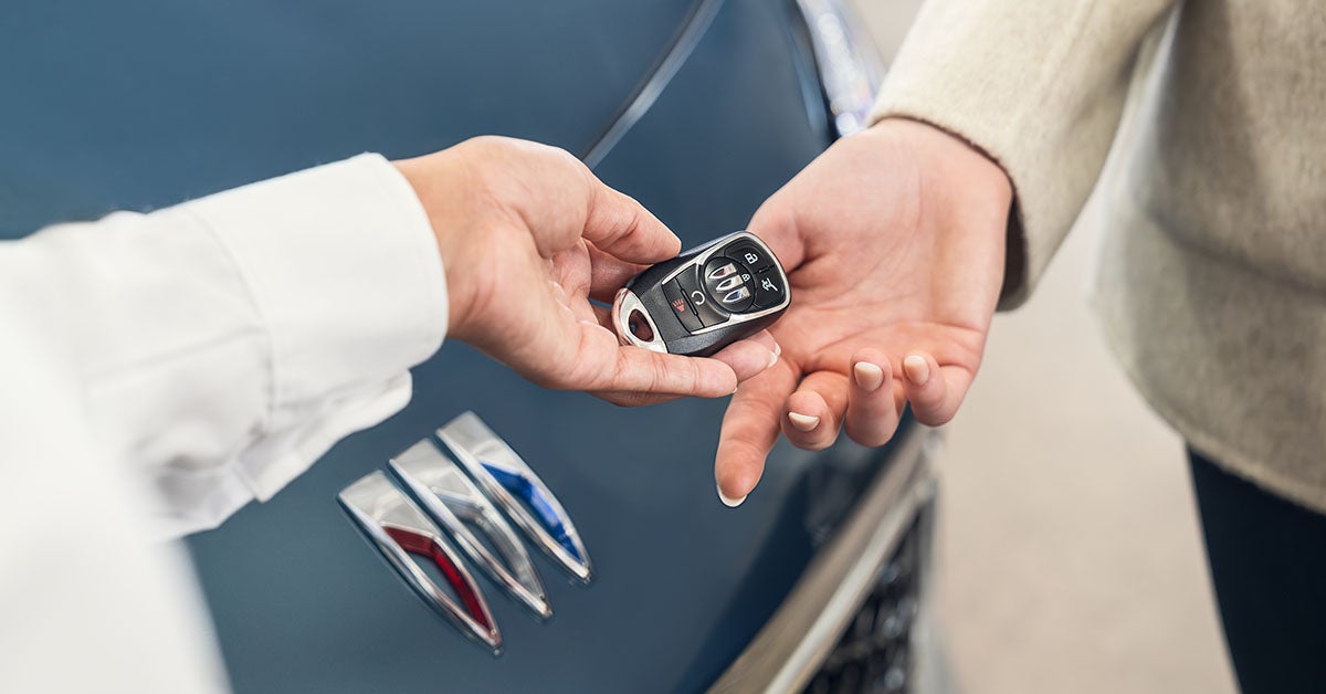 Buick keys handed to customer.