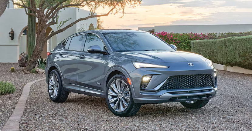 2026 Buick Envista SUV in gray parked in desert-style driveway