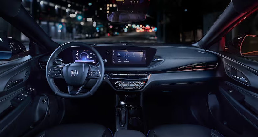 2026 Buick Envista interior dashboard and touchscreen at night at Anderson Buick GMC of Abingdon