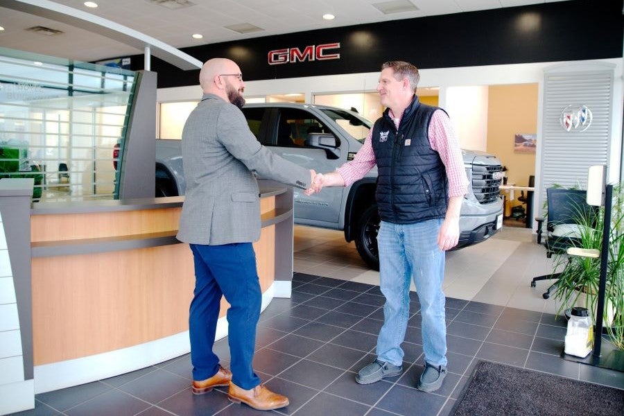 Customer and salel rep shaking hands in Anderson of Abingdon